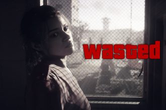 A dimly lit scene featuring a person near a window with the bold red text "Wasted," referencing GTA VI’s infamous game over screen.